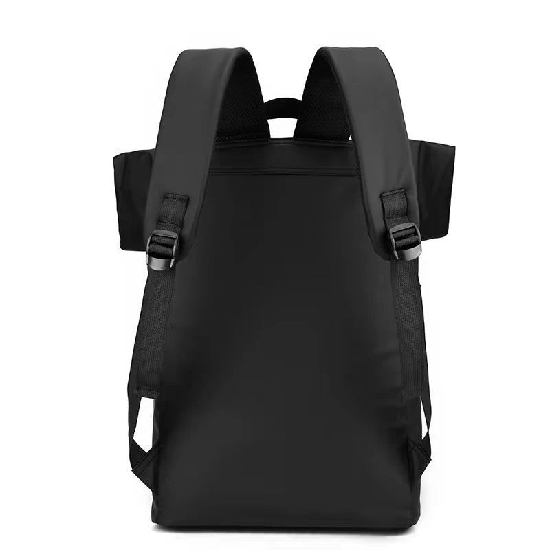 The back pf a Black expandable nytlon backpack with zip pockets outside