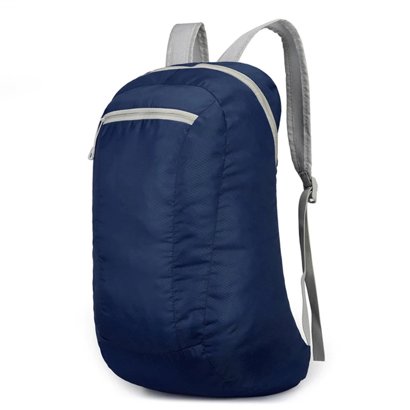 Navy blue nylon foldable lightweight backpack with grey straps