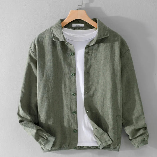 green button up jacket worn over a t-shirt