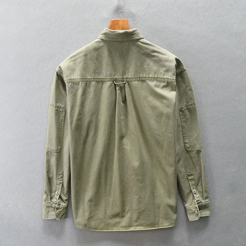 Back of green Washed cotton overshirt with double chest flap pockets and detailed topstitching. 