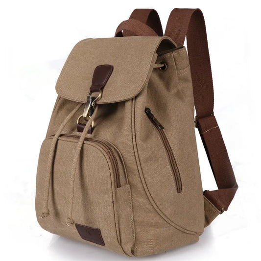 brown Large capacity backpack made from durable canvas material and lined with smooth polyester, with interior pockets.