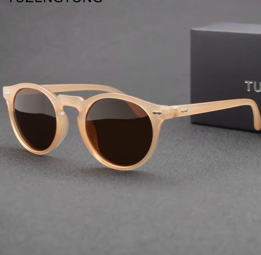 Classic sunglasses with oval plastic brown lenses.