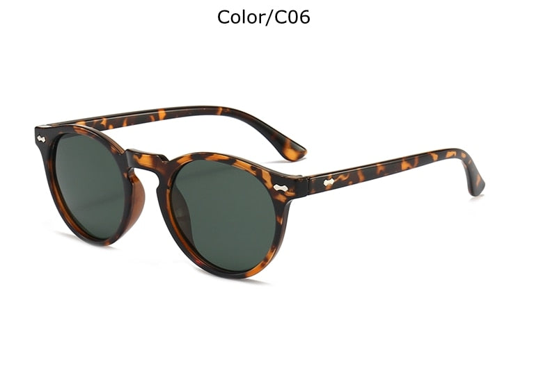 Classic sunglasses with oval plastic green lenses.