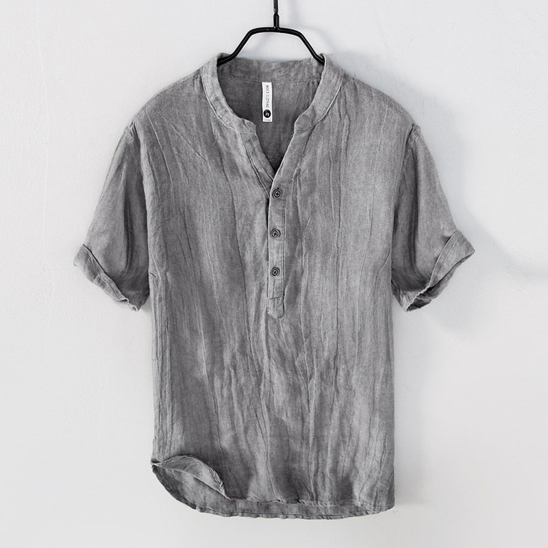 Grey Shirt with relaxed fit and short sleeves  with Round stand-up collar V-neck front opening .