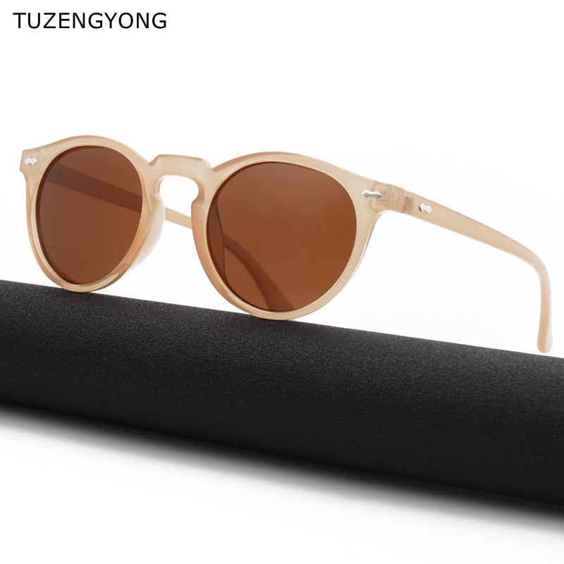 Classic sunglasses with oval plastic brown lenses.