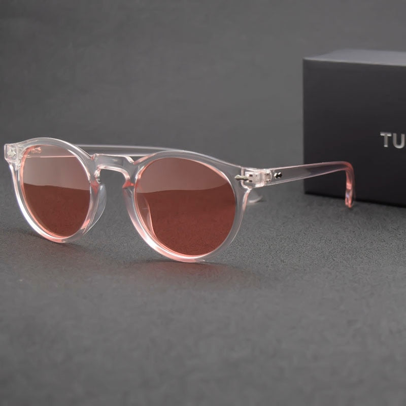 Classic sunglasses with oval plastic pink lenses.